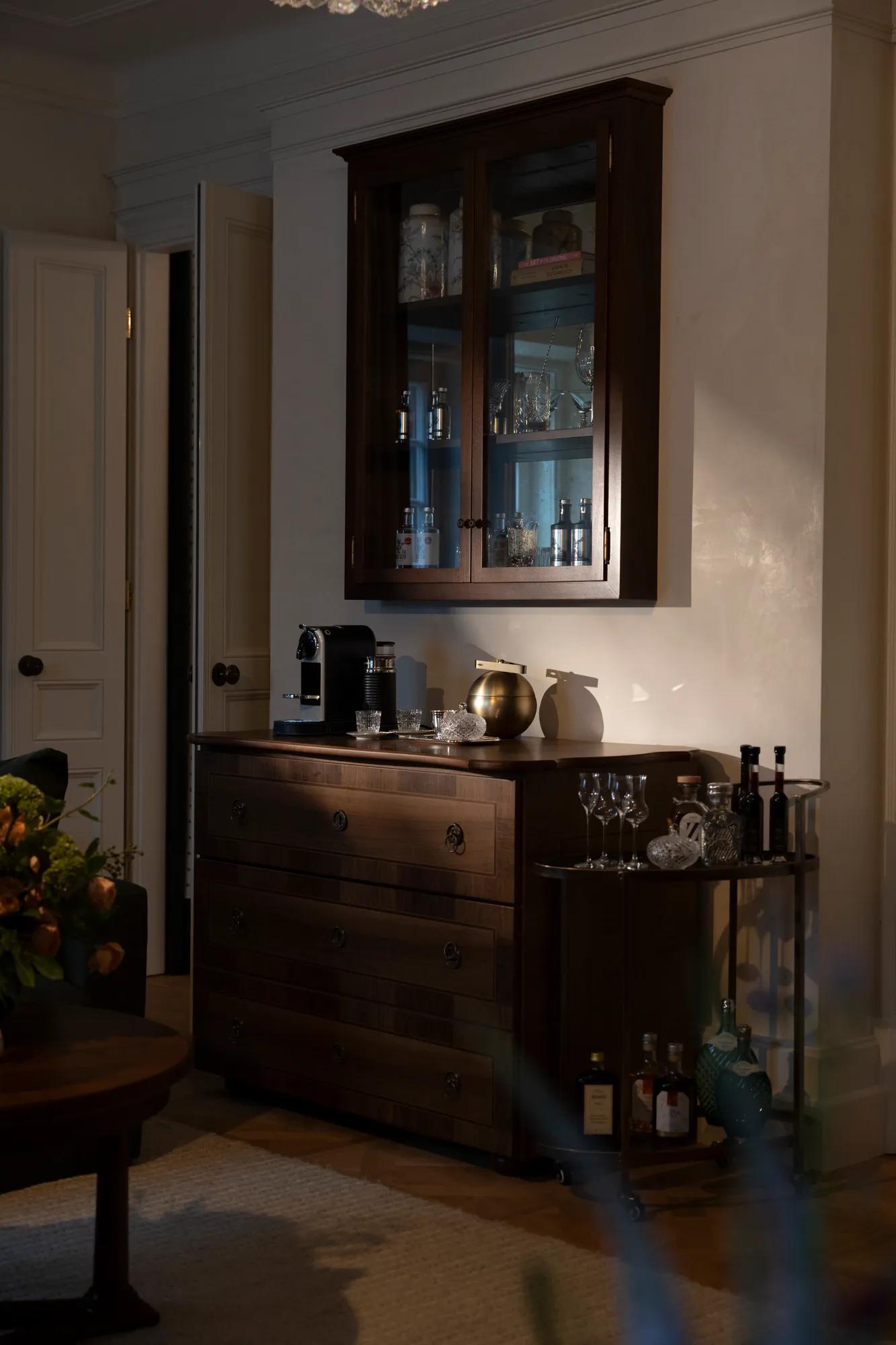 Minibar showcasing the different drinks and glass ware including our brotginsky gin.  