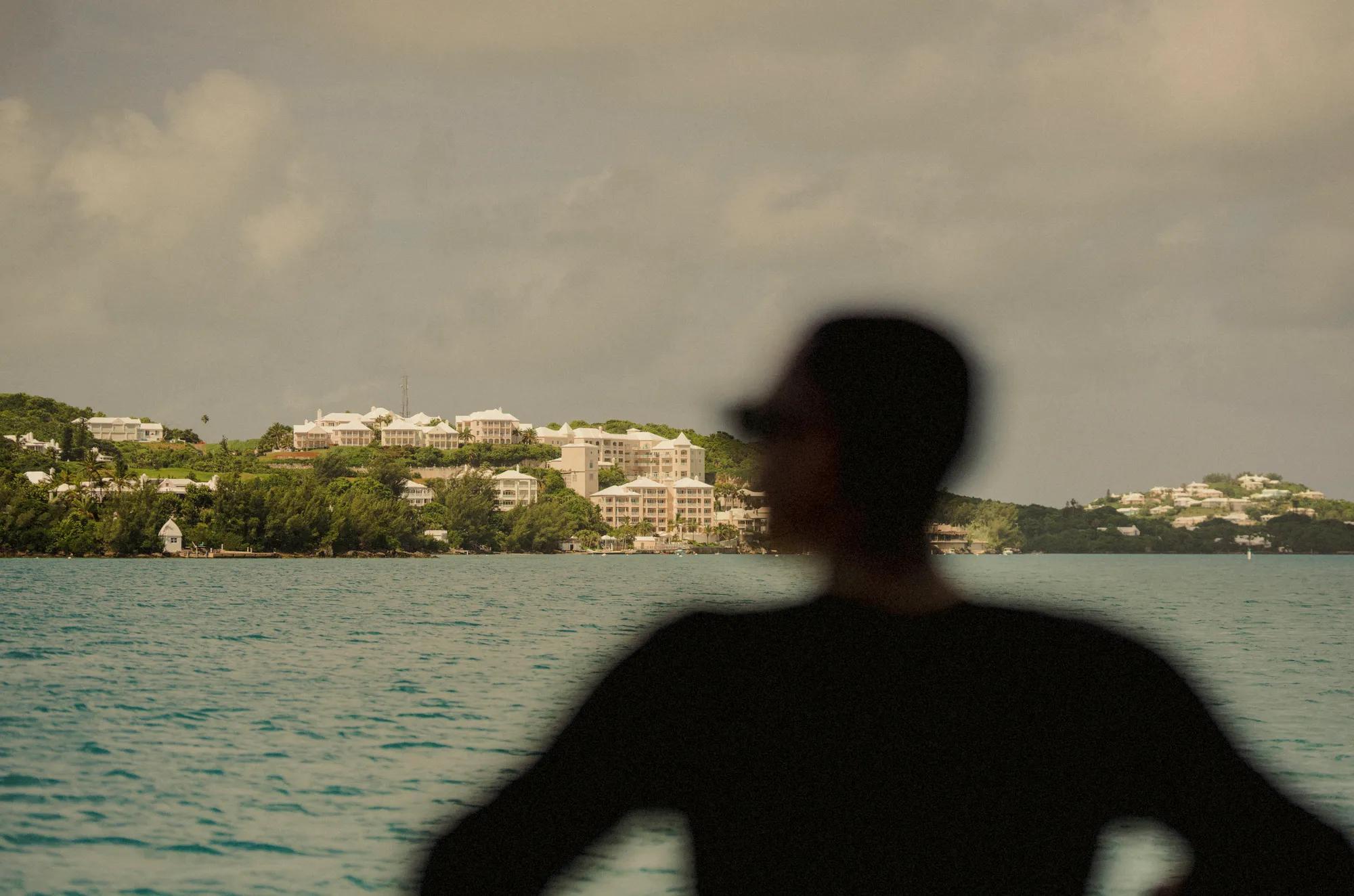 Blurred person overlooking the water and Rosewood Bermuda