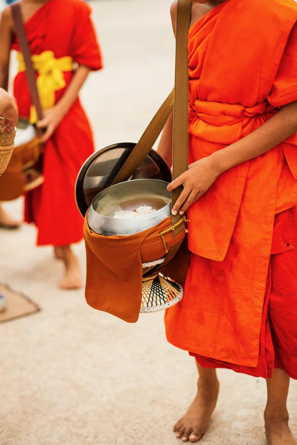 Alms offering luang prabang