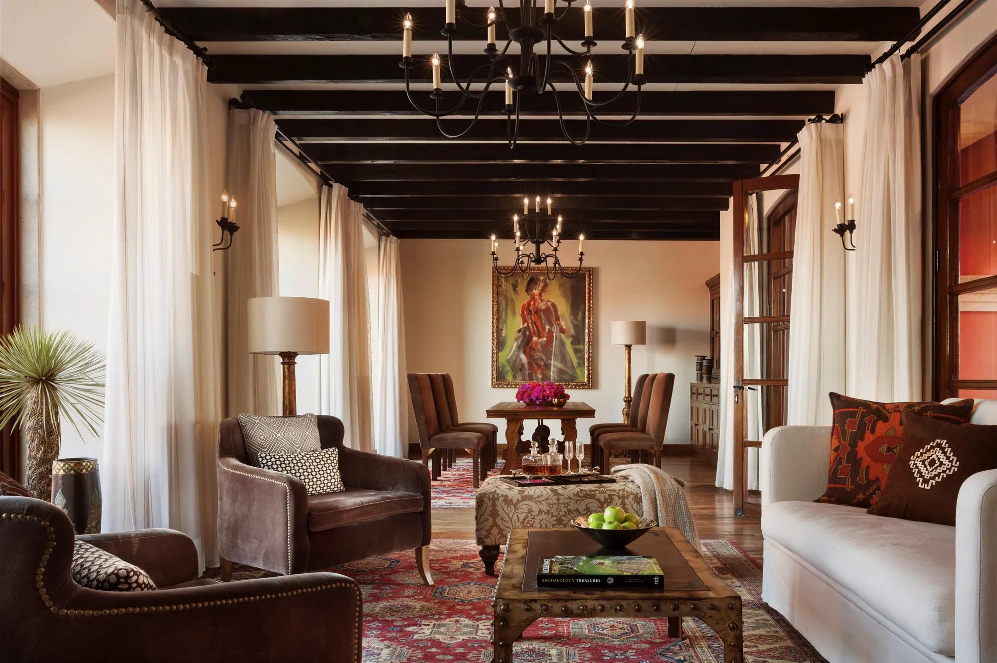 Rosewood Suite at Rosewood San Miguel de Allende featuring a spacious living and dining area, artisan décor, and abundant natural light. 