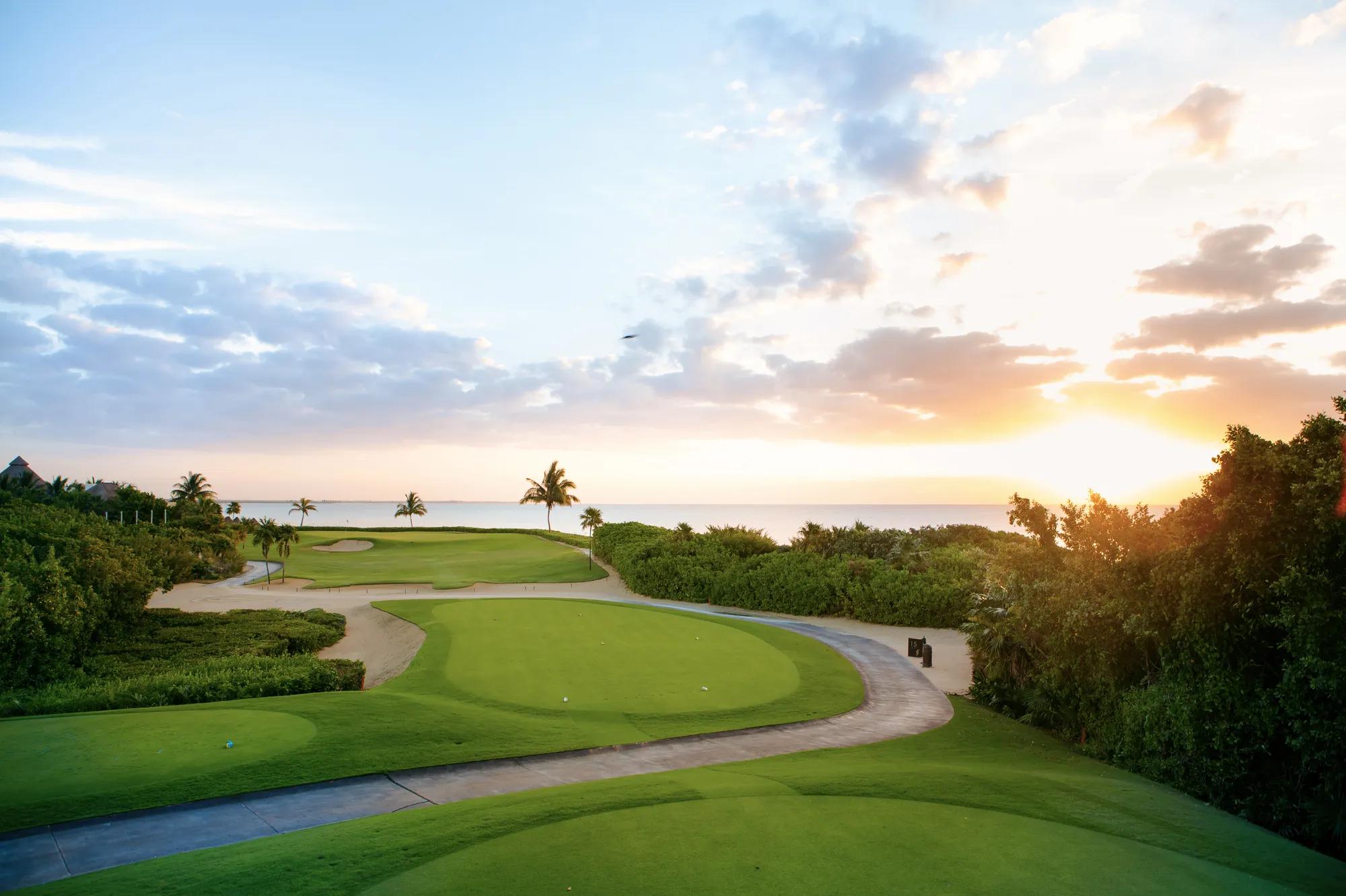 Boat with a romantic dinner setup floating on a lagoon, nestled between calm waters and surrounding mangroves.