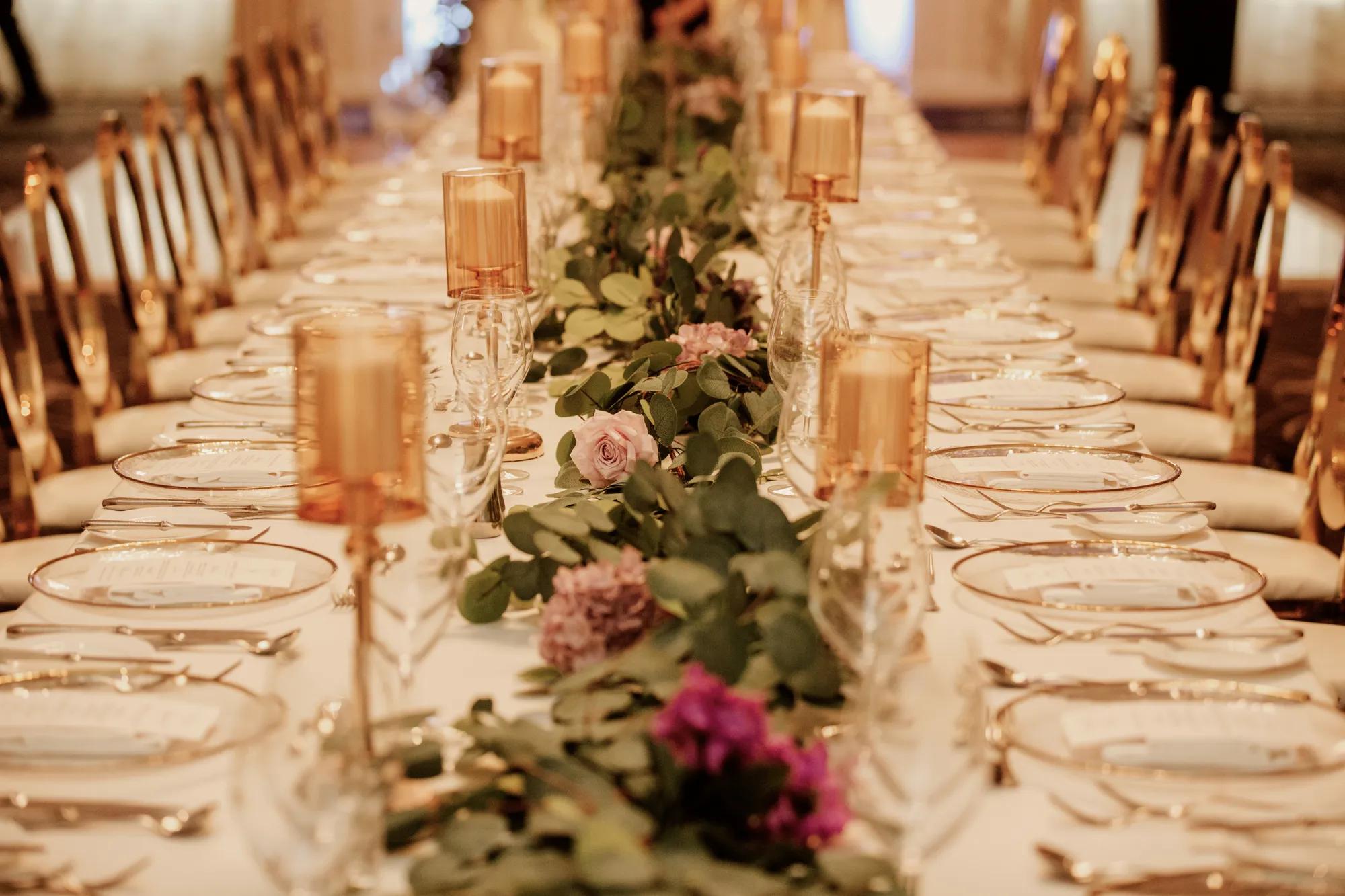 Long wedding table setu with flower centerpiece