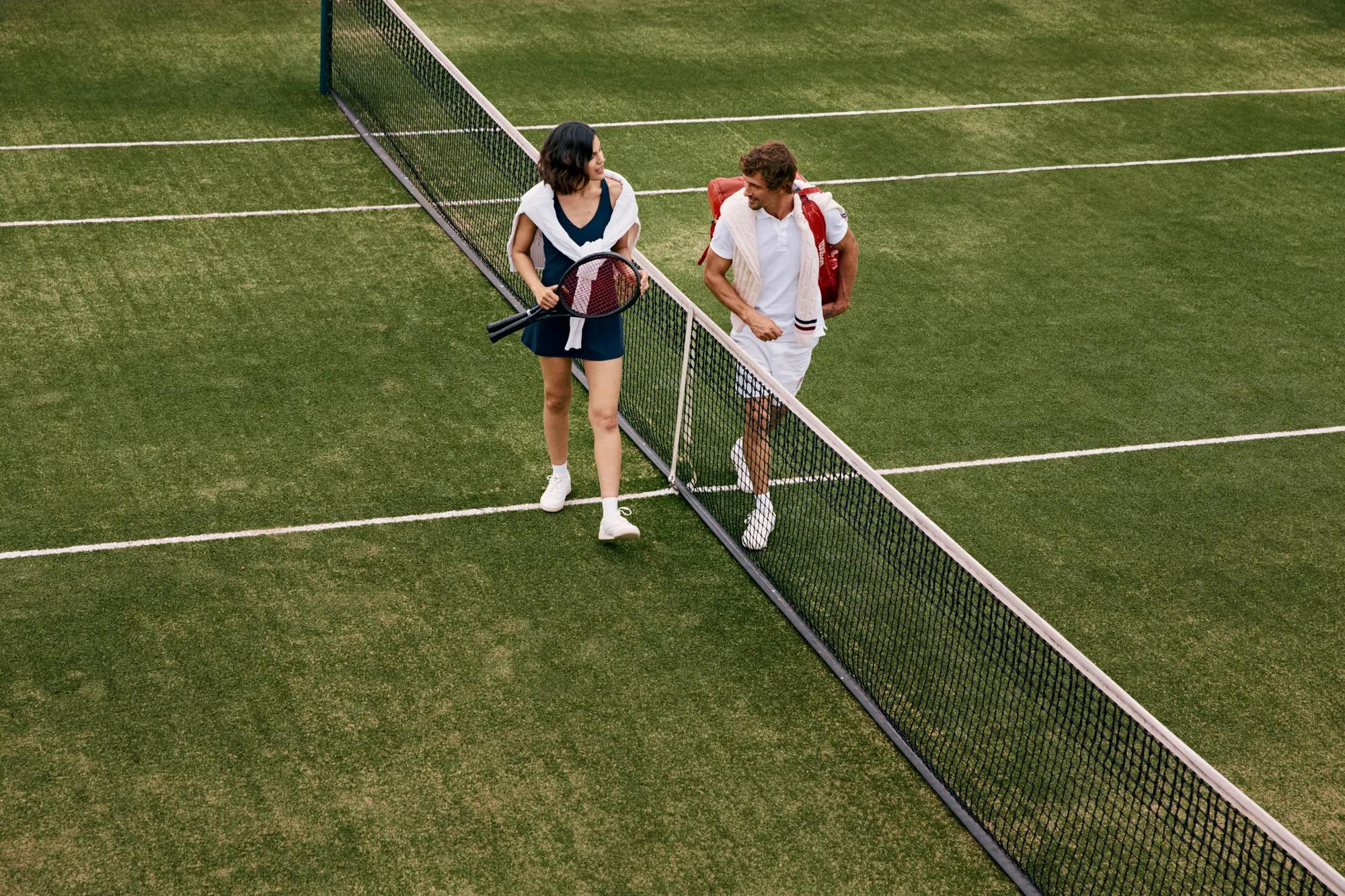Couple playing tennis