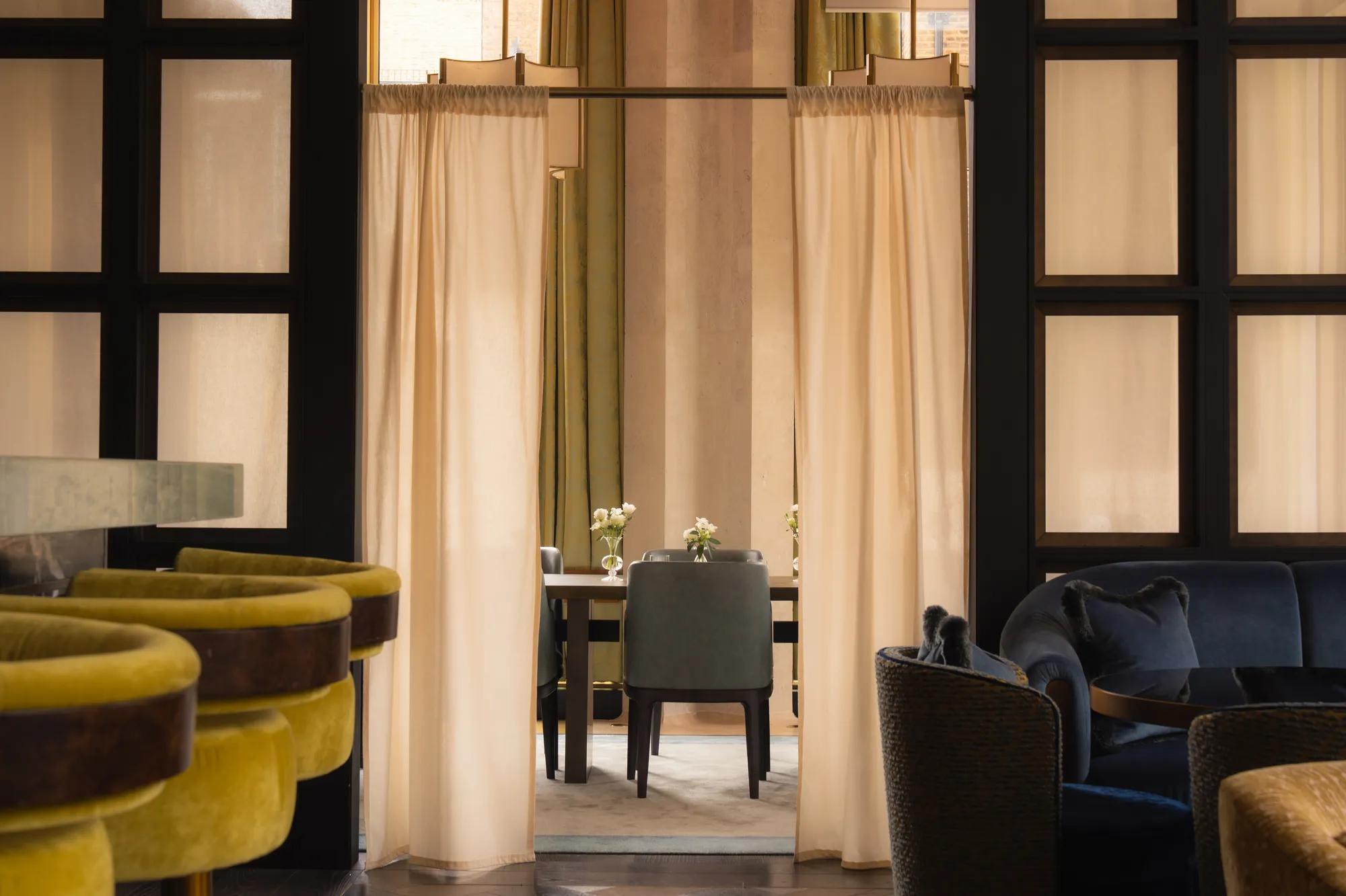 private dining room in tobi masa hidden behind linen curtains 