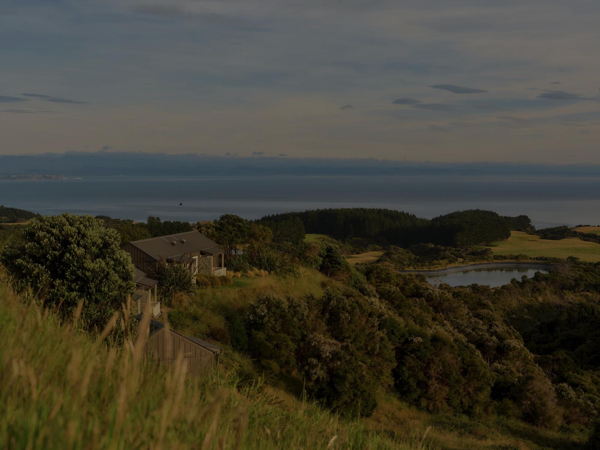 Overlooking Rosewood Cape Kidnappers luxury suites, with views of the farm and the Pacific Ocean. 