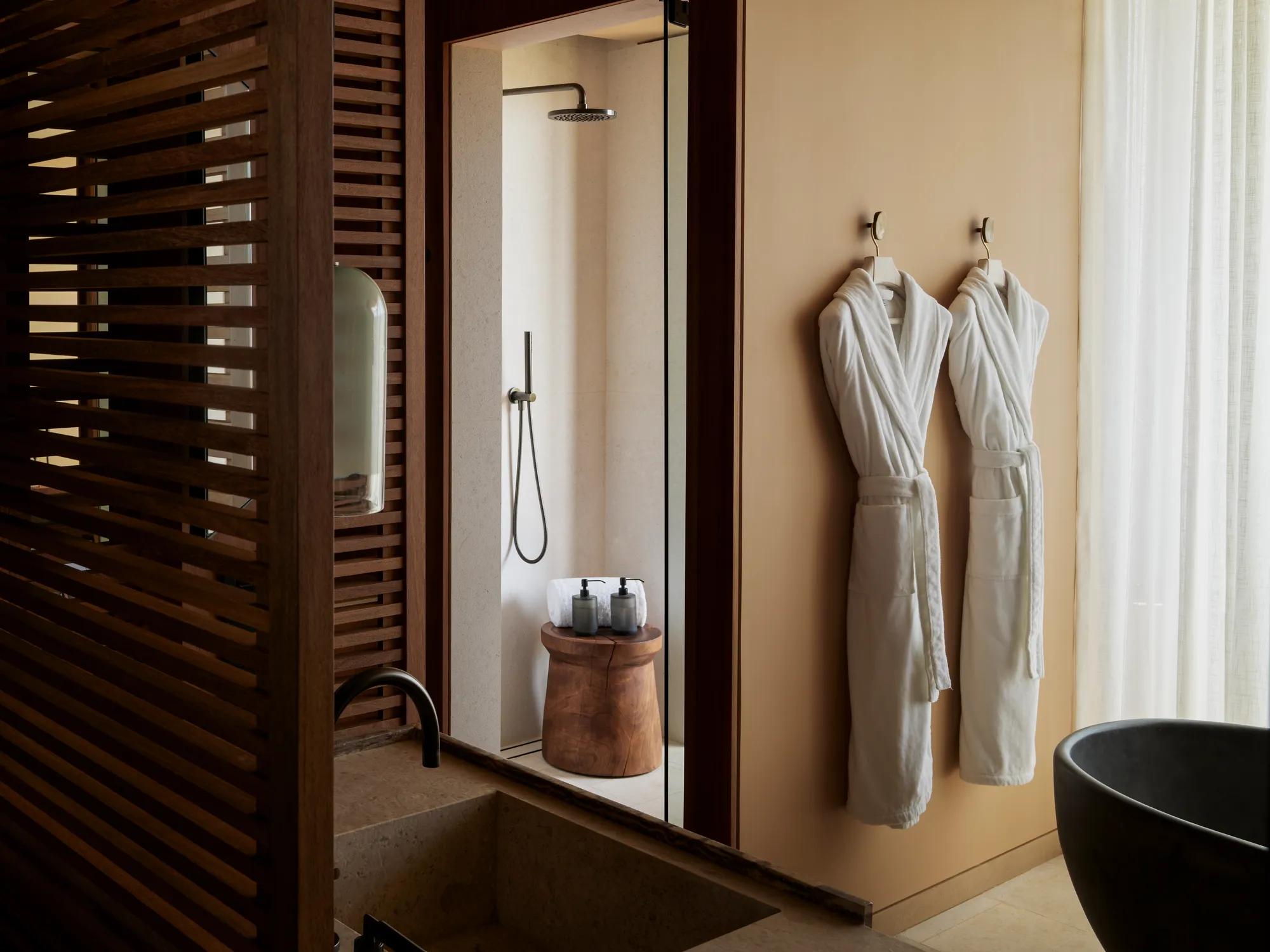 Facilities Suite Beachfront Studio Suite Bathroom Shower and Tub