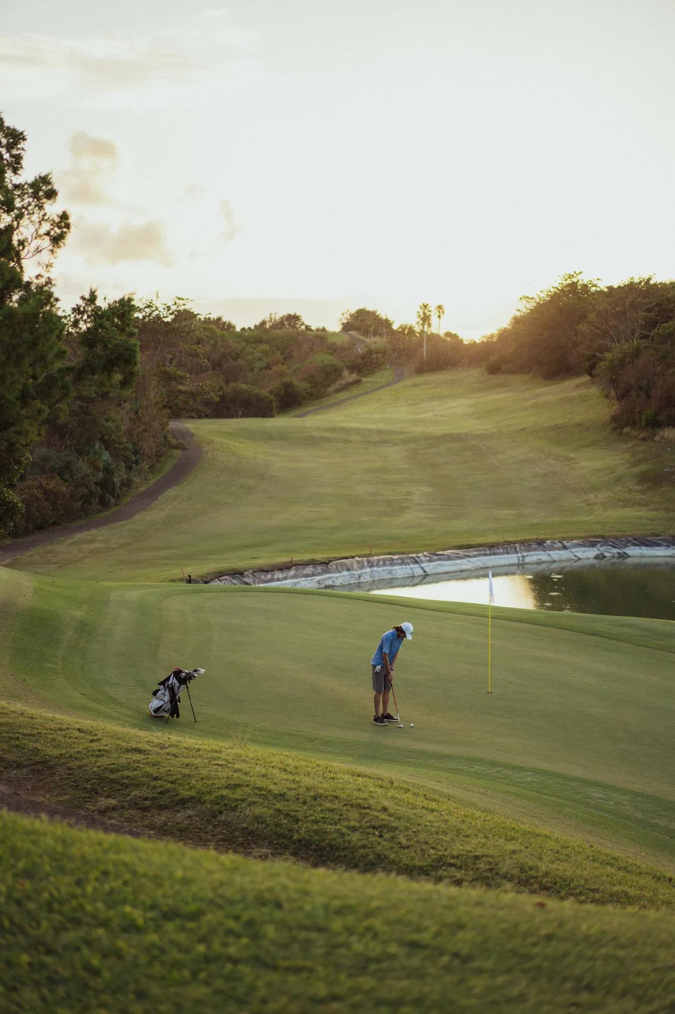 A gentleman playing golf