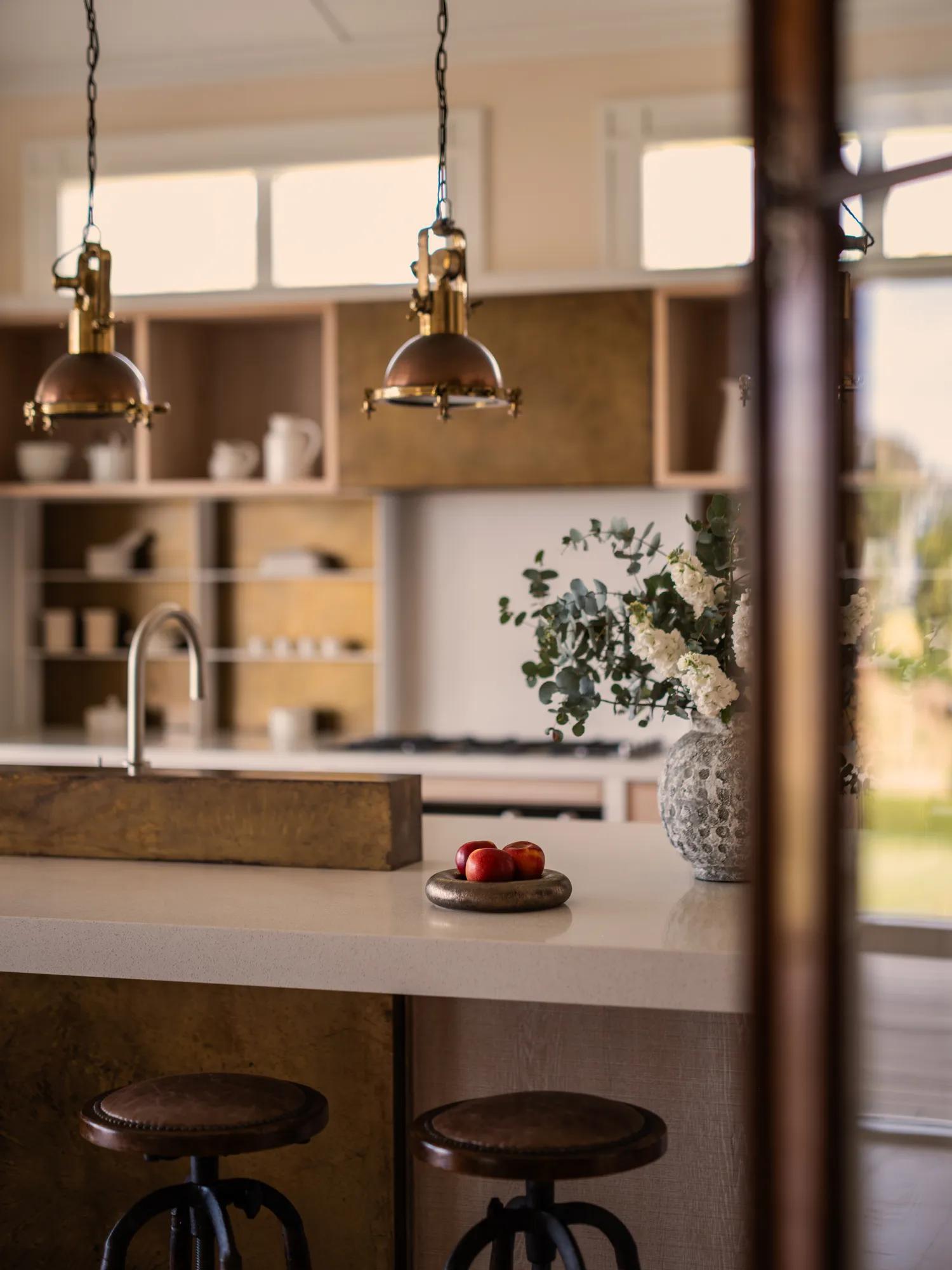 Spacious contemporary kitchen in the luxurious four bedroom villa at Rosewood Kauri Cliffs.