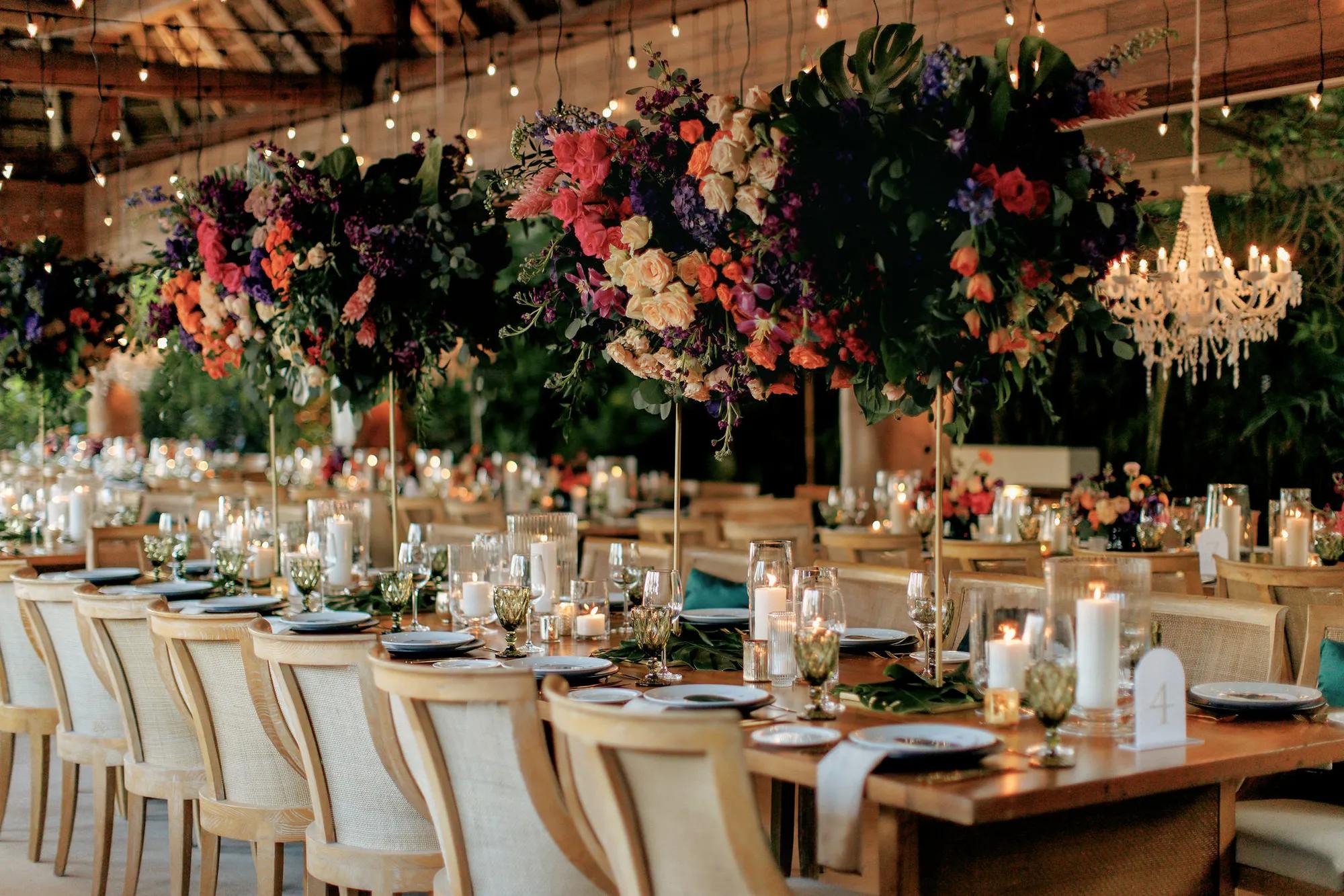 Rosewood Mayakoba - A destination wedding reception under hanging floral installations
