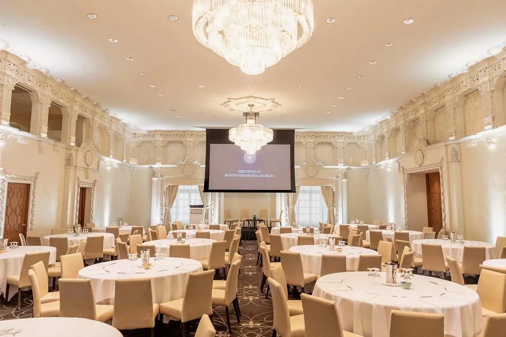 Elegant and historic ballroom with rounds