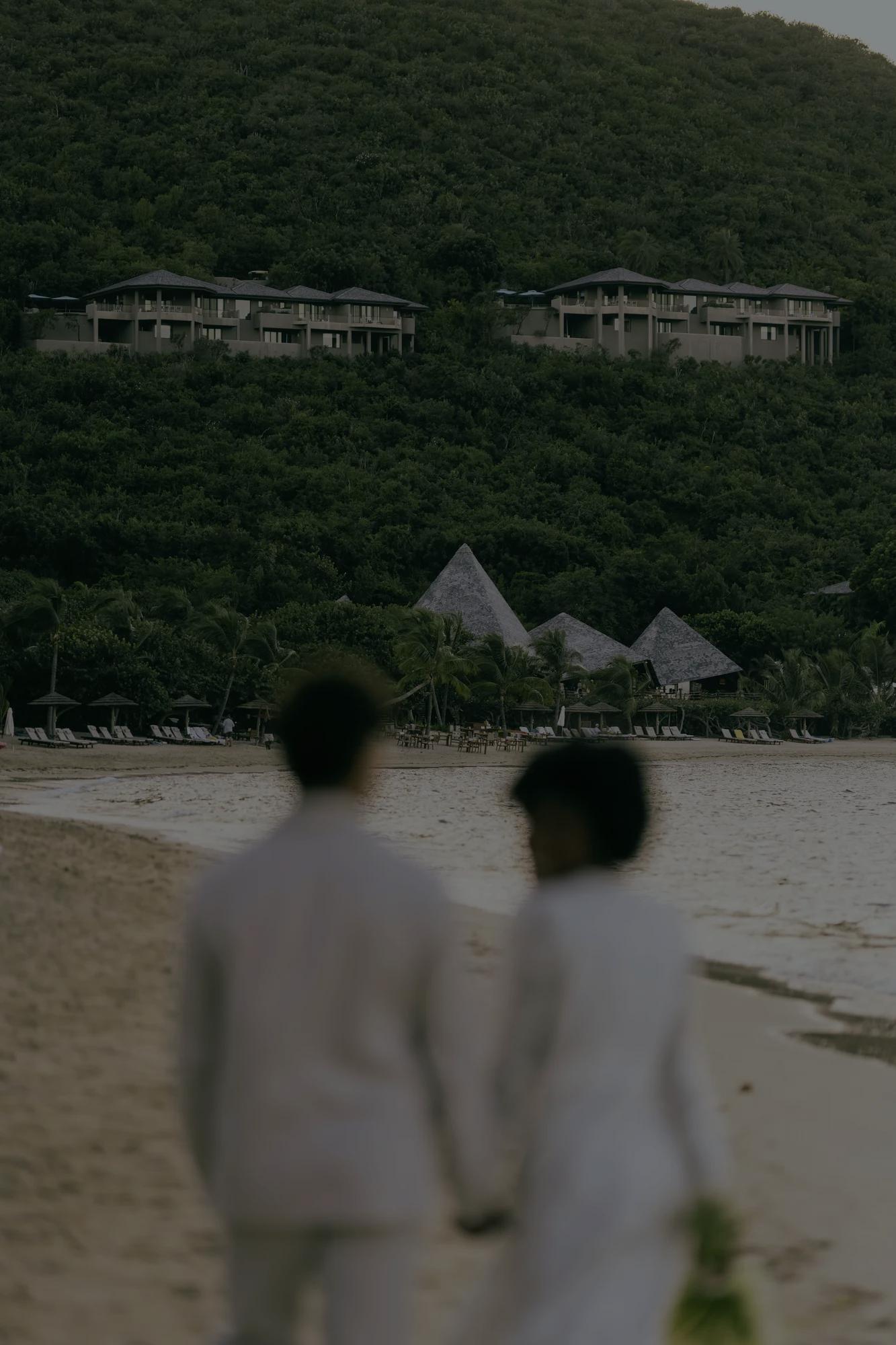 Couple Walking on Beach