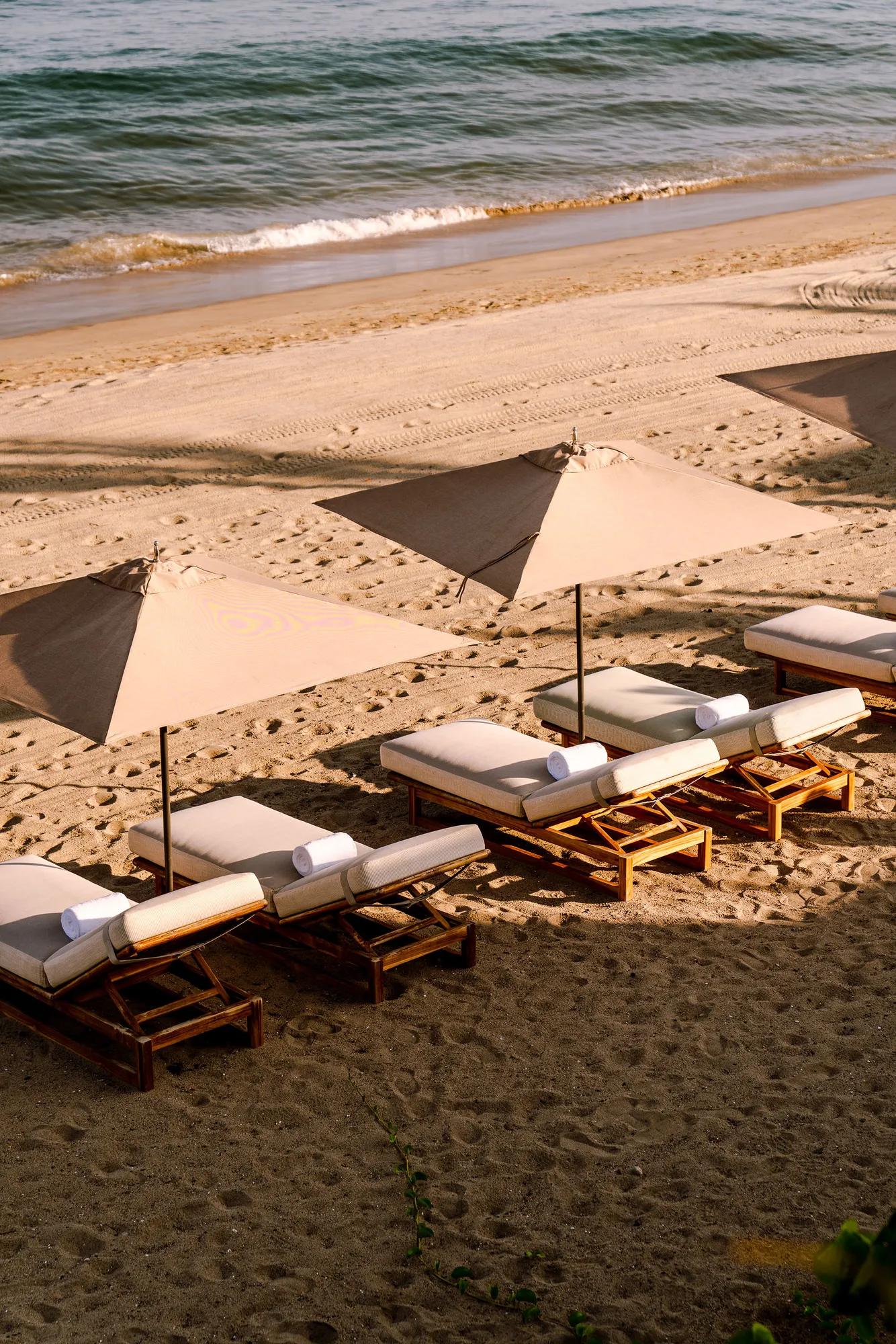 Beach club and chairs by the ocean