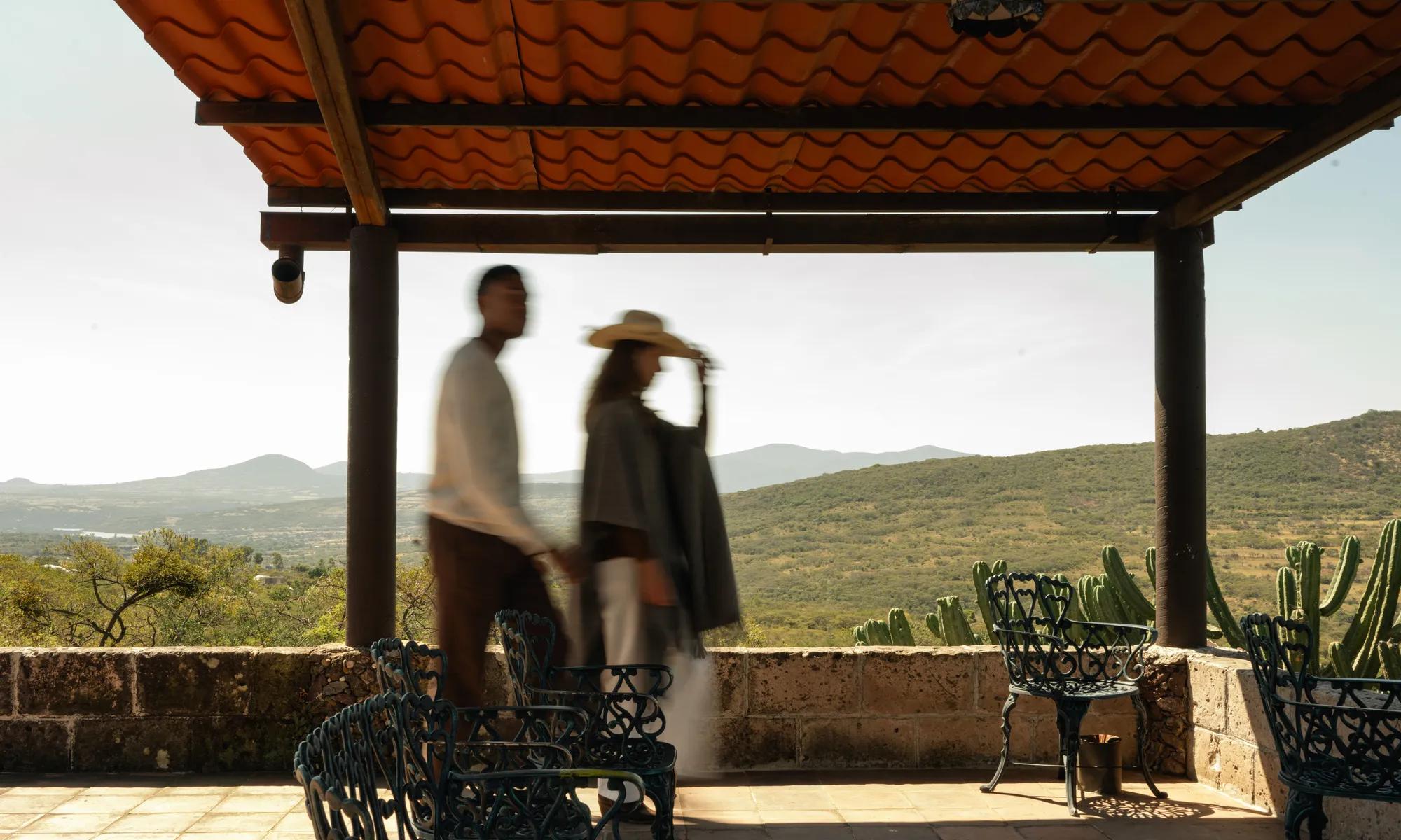  Close-up of the upper spires of the Parroquia de San Miguel Arcángel set against a clear sky.