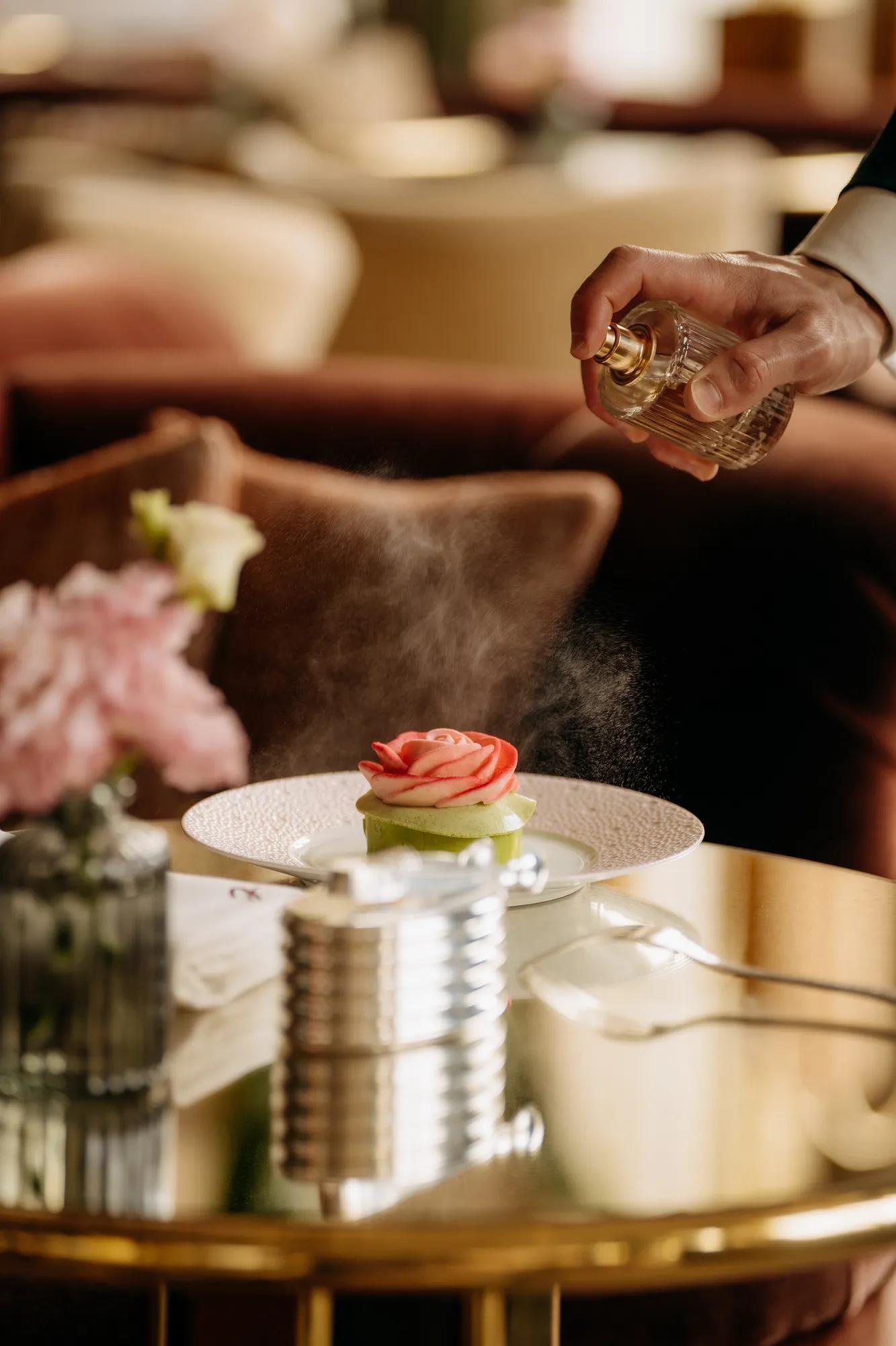 perfume sprayed on to cake at Jacqueline