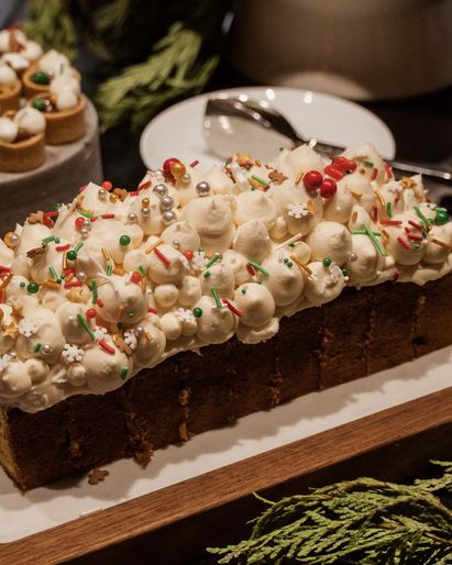 Dessert display during Santa Brunch at CUT D.C. featuring buche de noel