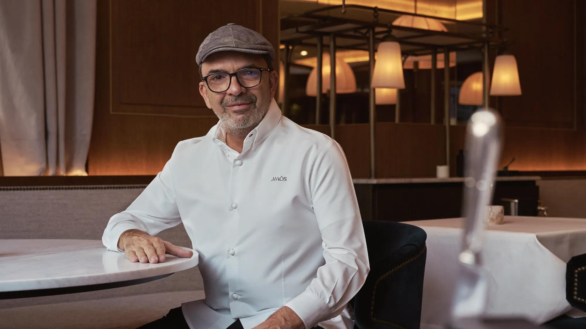 Chef Jesús Sánchez seated inside the restaurant