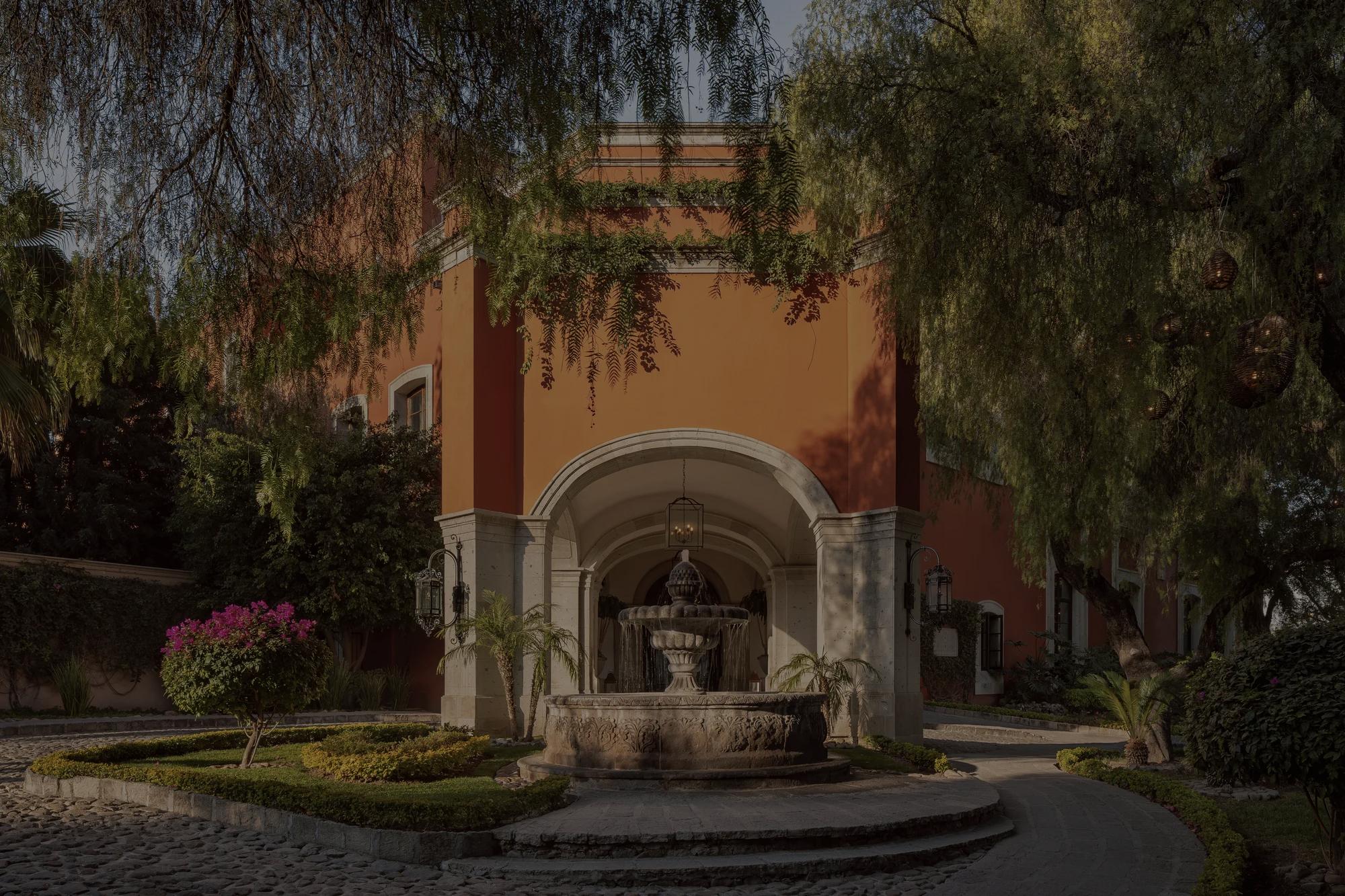 Aerial view of La Parroquia de San Miguel Arcángel and historic town center in San Miguel de Allende, Mexico.