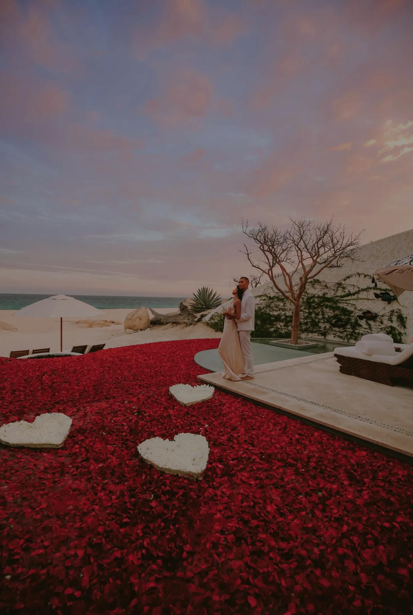 Couple looking at the ocean in a private villa in los cabos