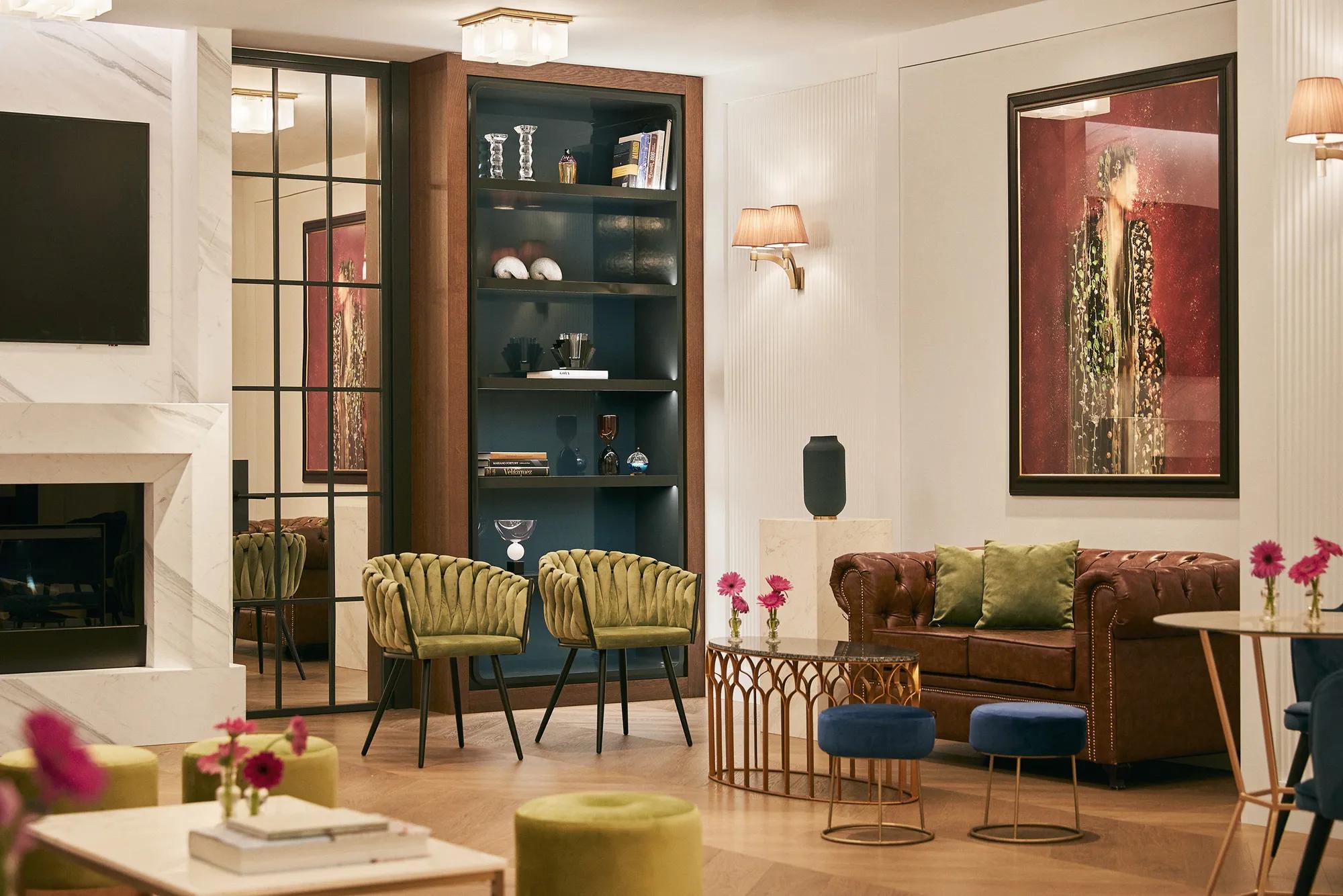 Elegant meetings and events space with modern décor, featuring cozy sofas and small tables at Rosewood Villa Magna in Madrid