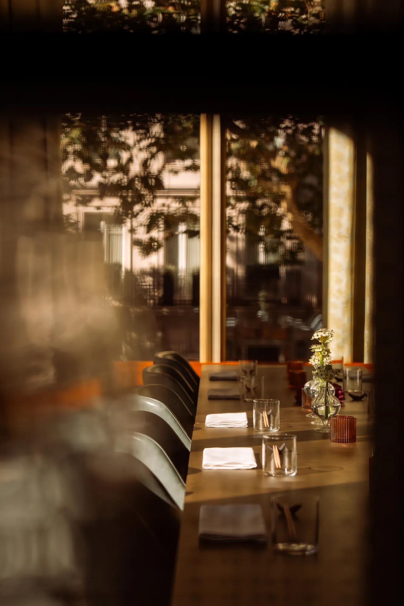 Close-up of private dining room which floor to ceiling windows
