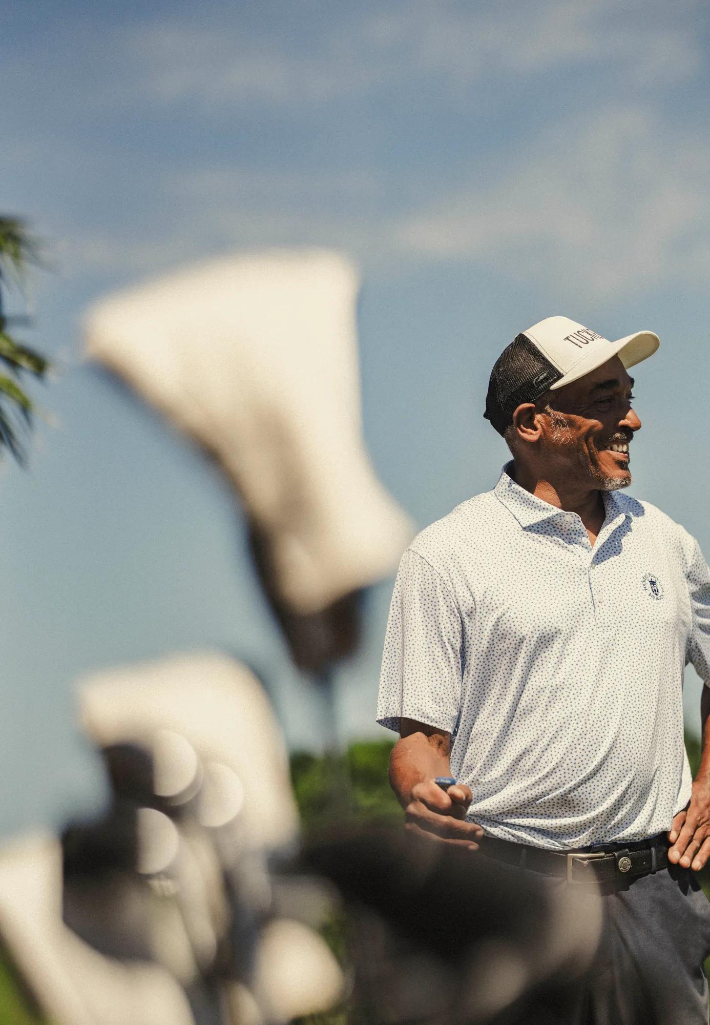 A gentleman playing golf