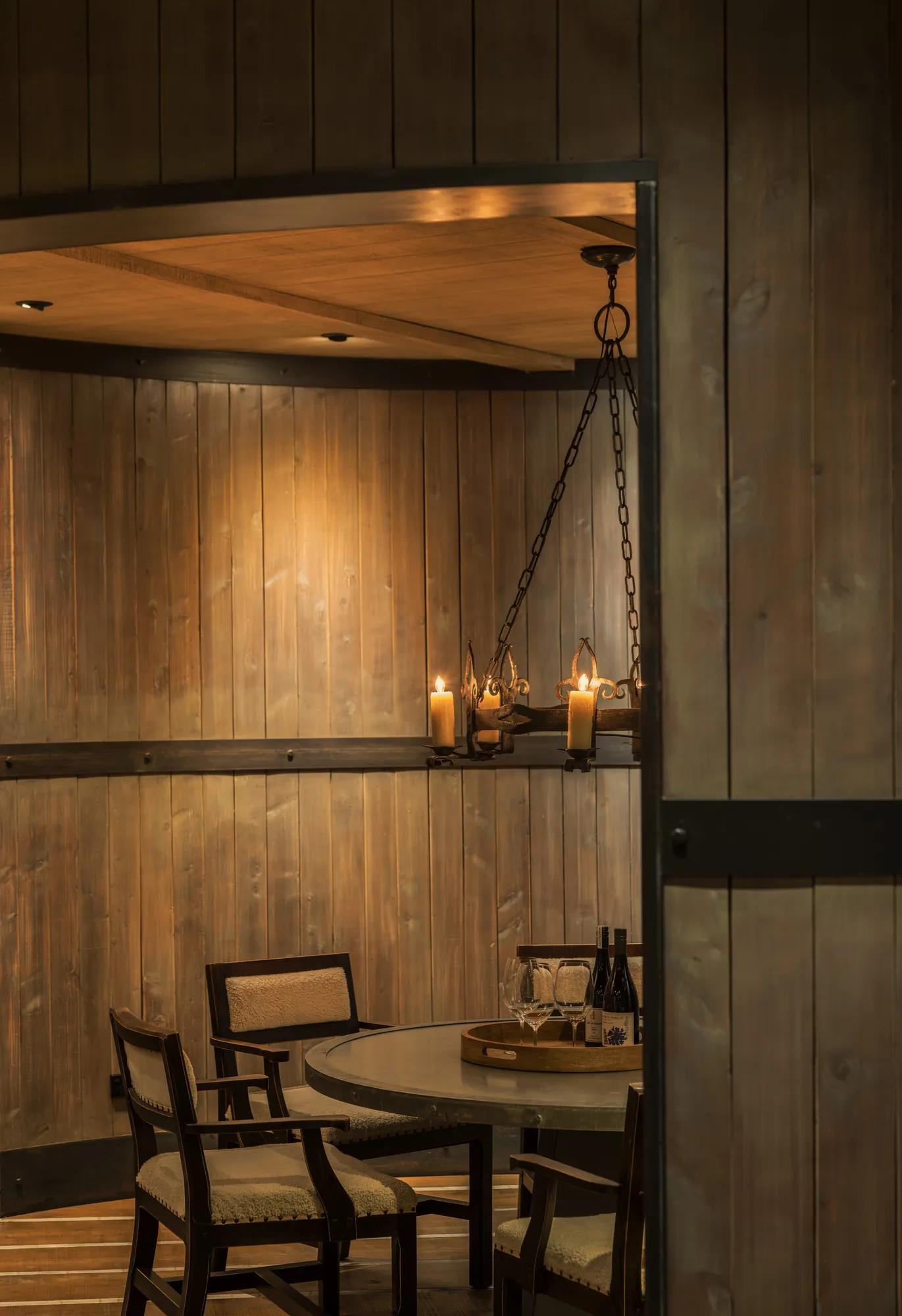 Cosy rounded private dining room in the Wine Cellar at Rosewood Cape Kidnappers, the room is modelled after an old grain silo. 