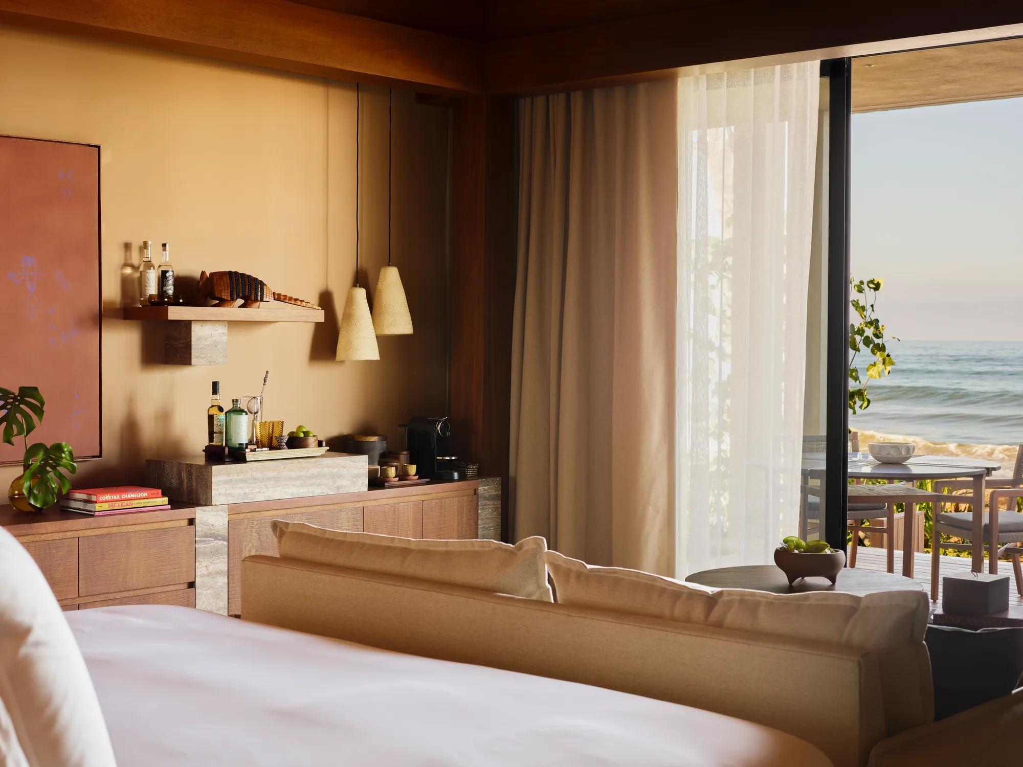 Facilities Suite Premier Beachfront Studio Suite Bedroom and Terrace View