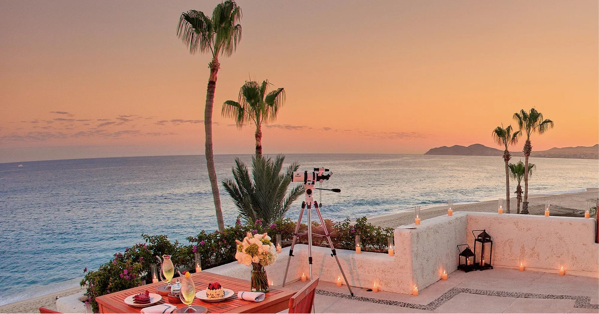 Las Ventanas al Paraíso - Sunset dinner table with a stargazing telescope