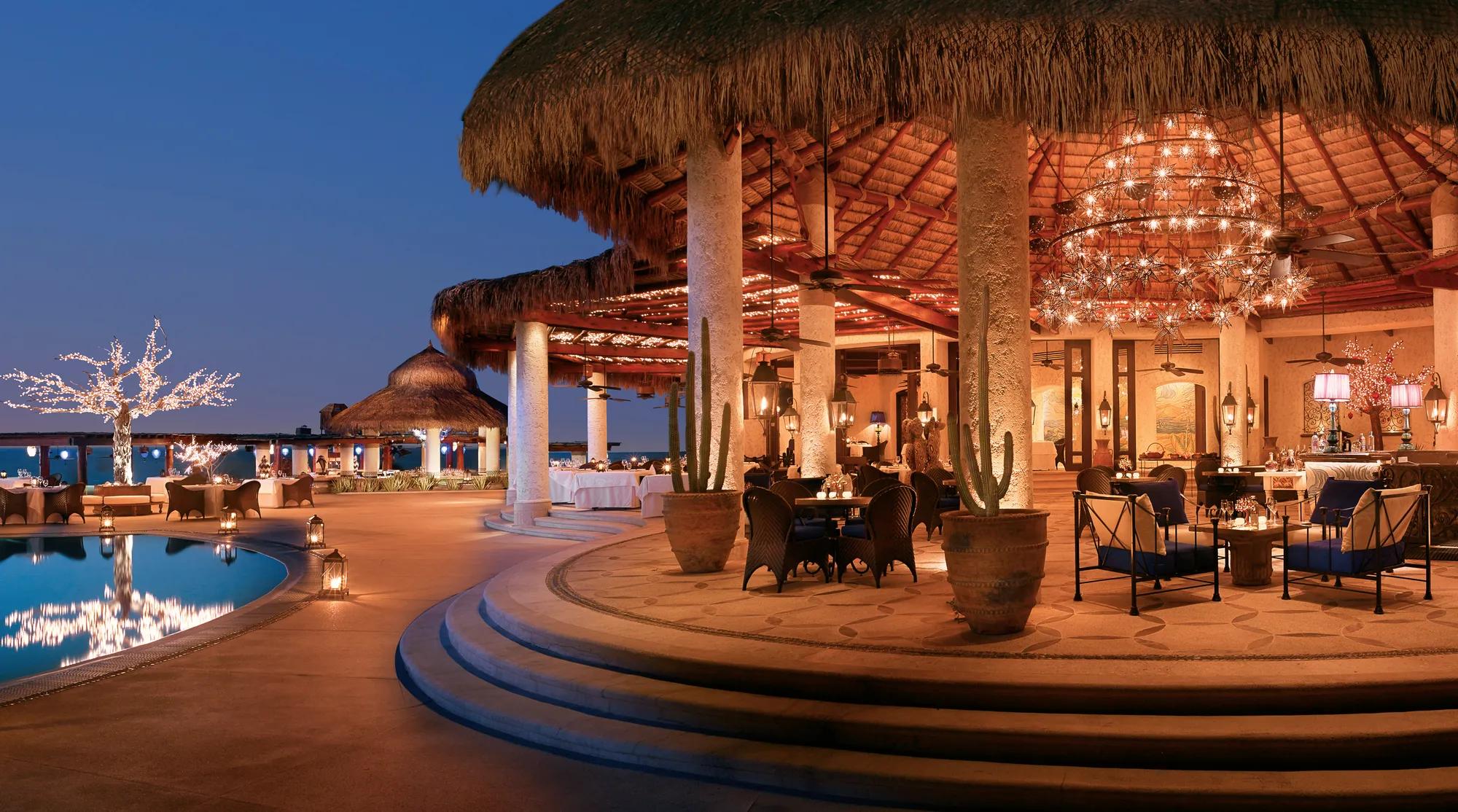 Private beach-front dining under a tree