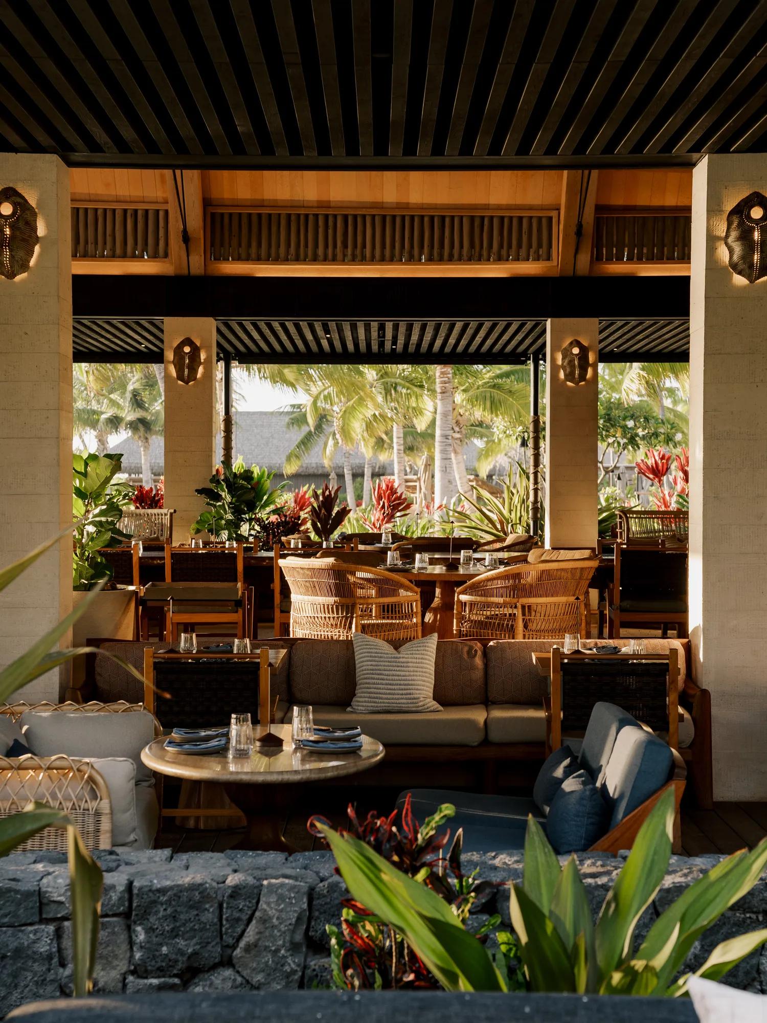 Moana restaurant tables with lush landscape in the background