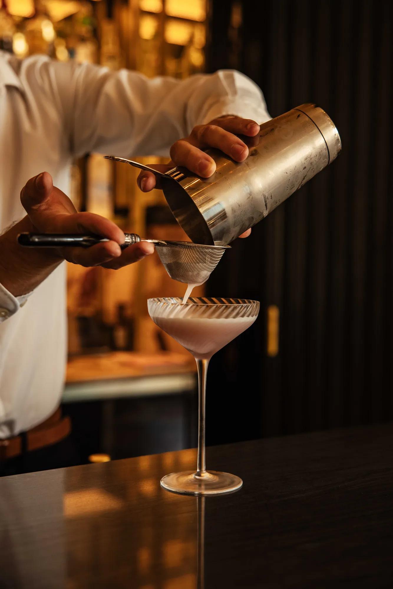 cocktail being poured at jacqueline abr