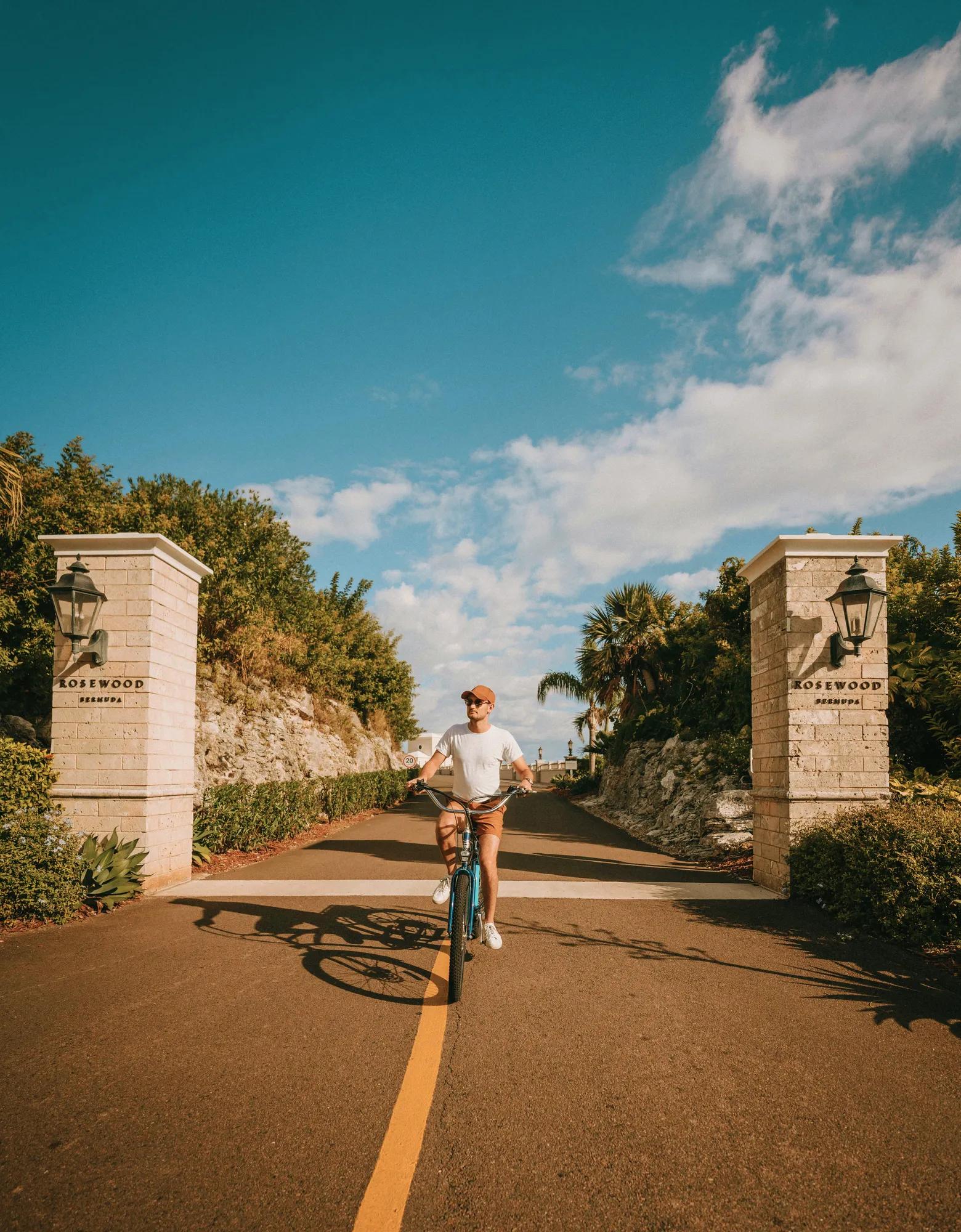 Biking at the entrance of Rosewood Bermuda