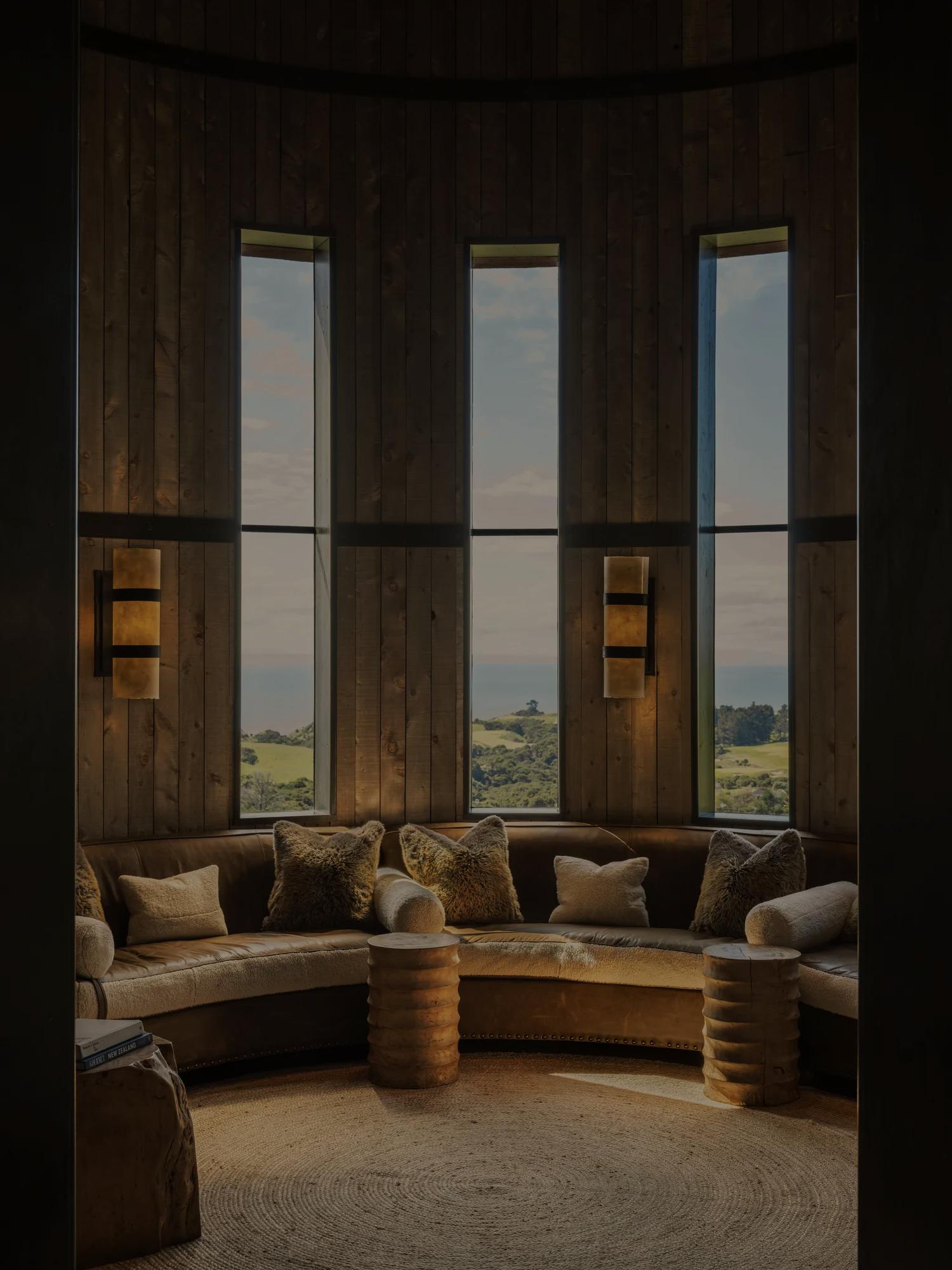 Cosy circular shaped seating area at Rosewood Cape Kidnappers, the room is modelled after an old grain silo. 