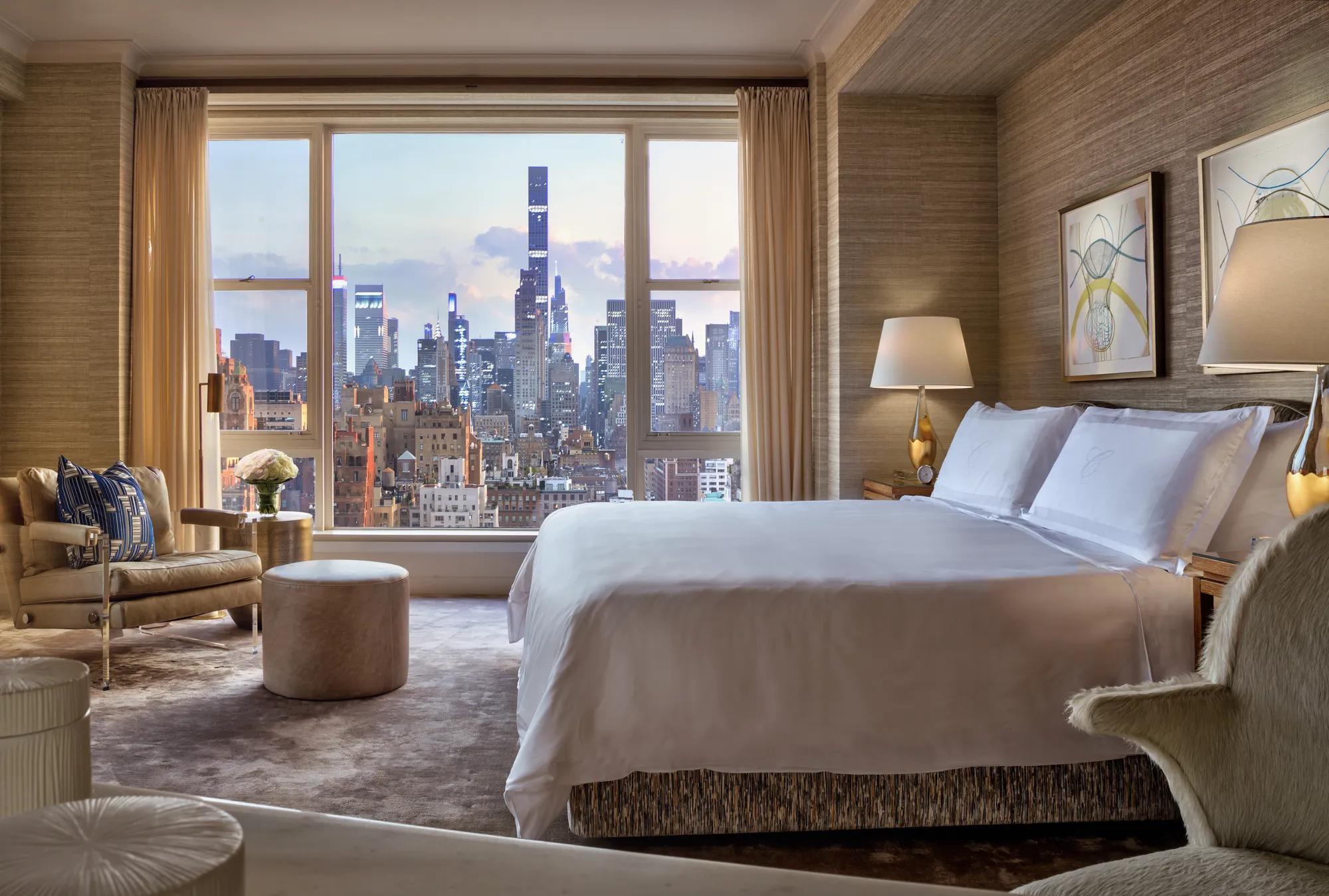Stylish bedroom looking over New ork City skyline. Perfect suite for any couple, or romantic new york city getaway. 