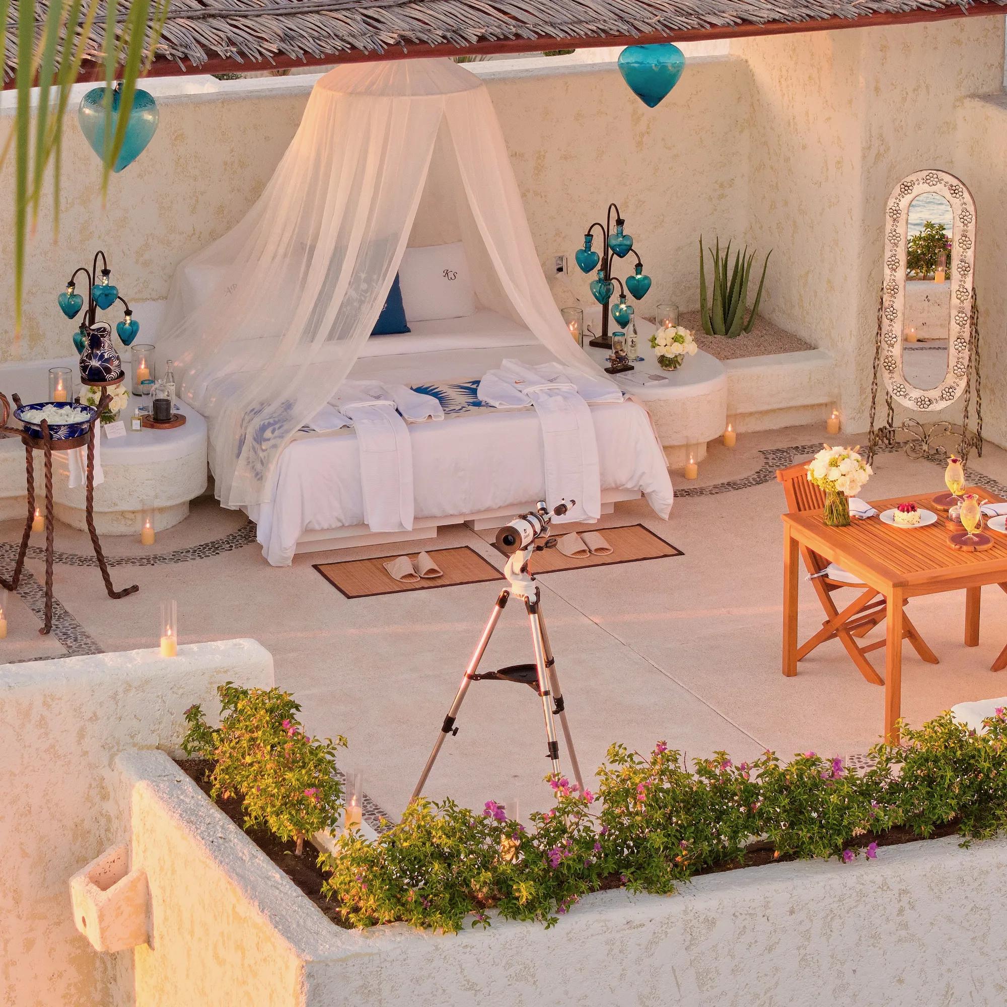 private oceanview rooftop terrace transformed into an outdoor bedroom to sleep under the stars