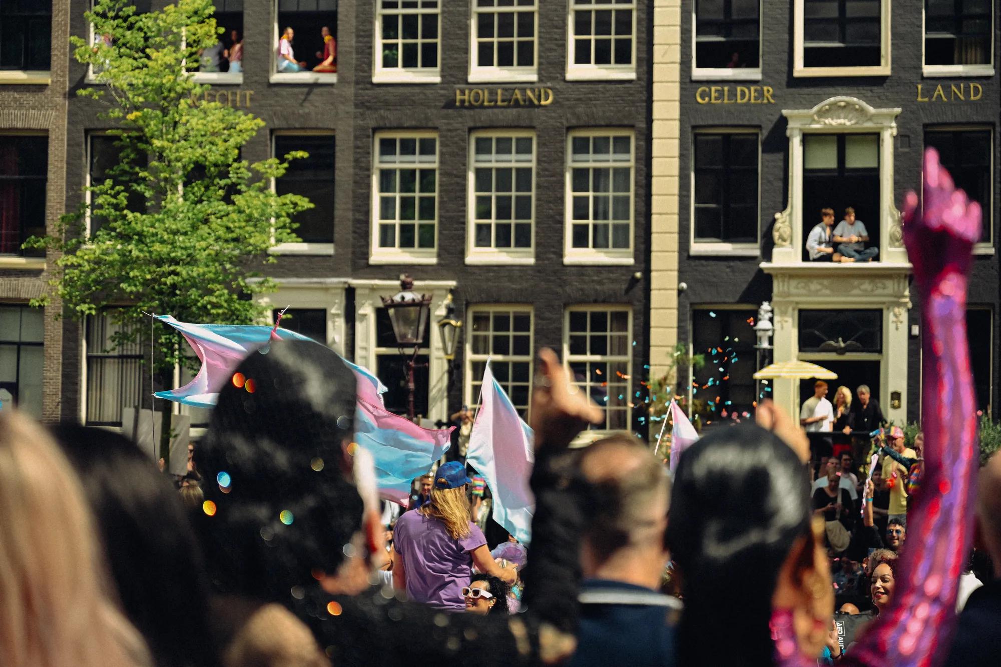Pride Parade people in colourful outfits